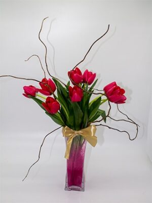 Florero tulipanes en vidrio